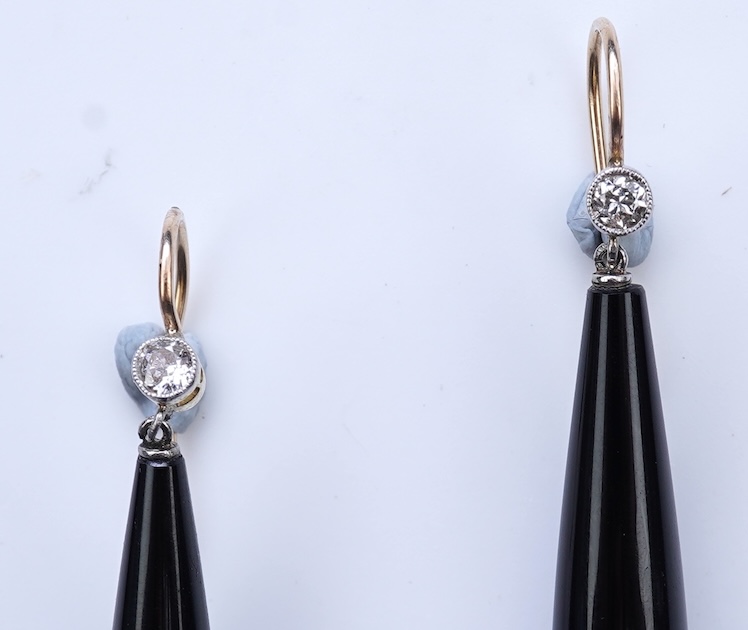A pair of Art Deco onyx and diamond earrings, early 20th century